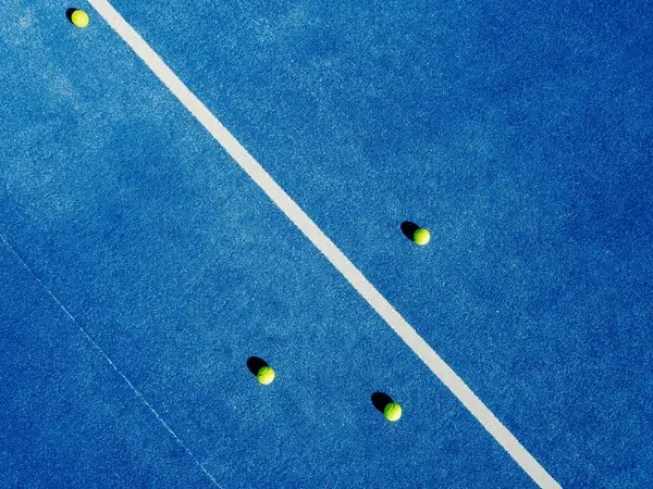 four-balls-on-blue-paddle-600nw-2520916619