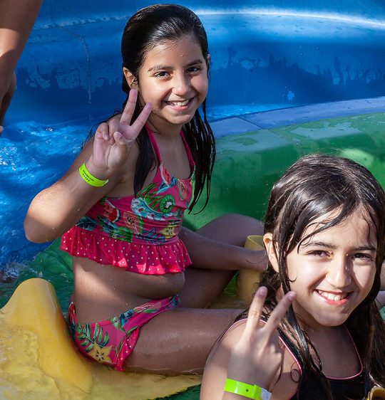 Kids having fun smiling in the Aquapark Eden Andalou 5 etoiles SPA, suites and aquapark Marrakech ALL inclusive